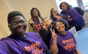 Youth Network students from Crispus Attucks High School pose for a selfie.